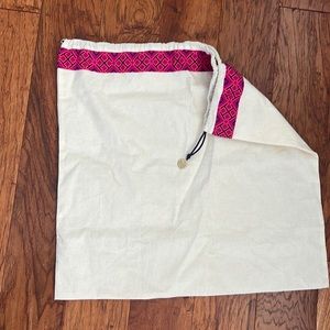 Tory Burch dust bag with charm